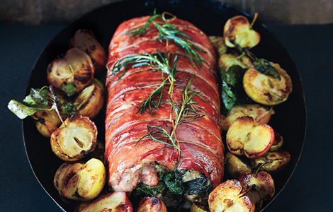 first_we_feast_thanksgiving_recipes_prosciutto_wrapped_pork_loin_with_roasted_apple_meat_main_course_bon_appetit